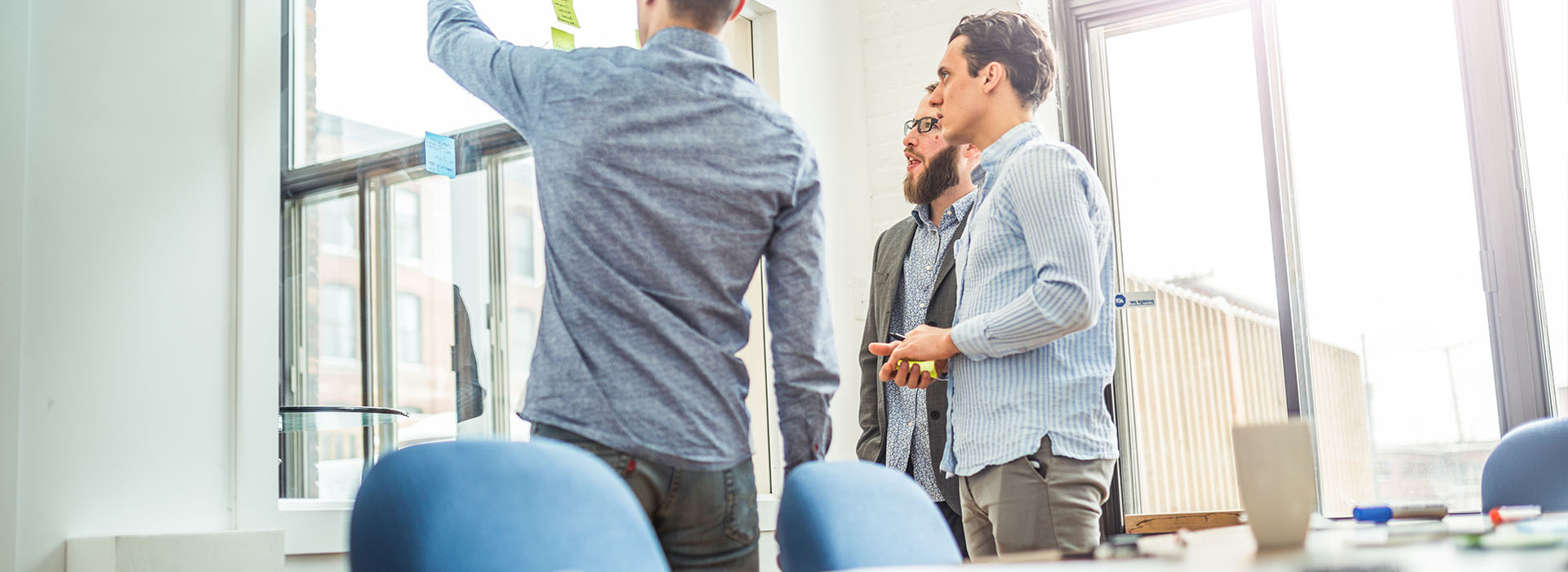 Employees brainstorming in an office