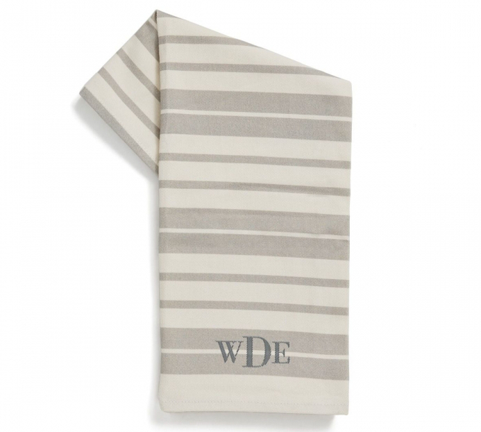 Photo of a monogrammed striped hand towel.